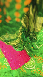 Green and pink bandhani suit set